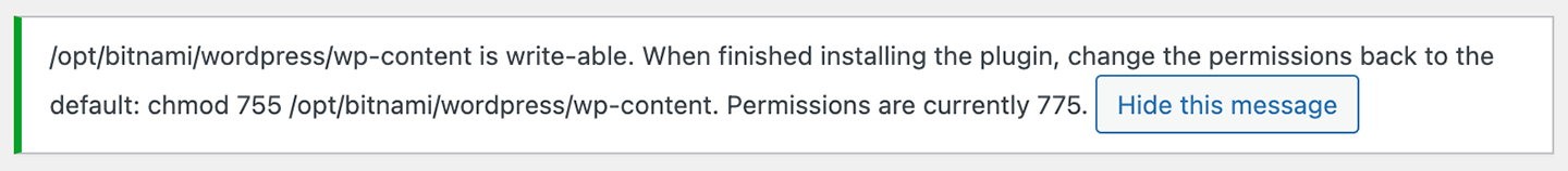 Screenshot of the WordPress plugin page showing a W3 Total Cache wp-content permissions notice